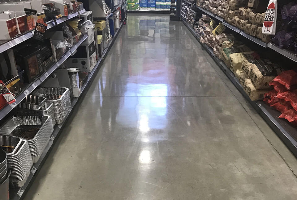 Pantheon on Grocery Floor down an aisle of tin pans and charcoal