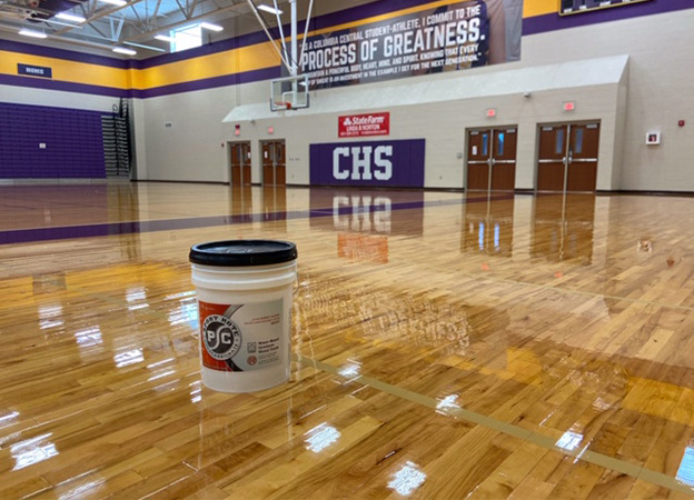 A Sport Kote PC pail on a shiny gym floor.